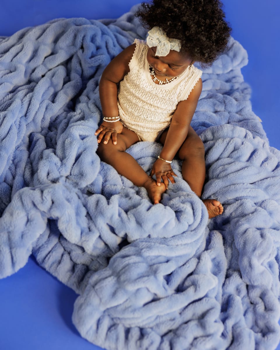 Hugs Light Caribbean Blue Blanket