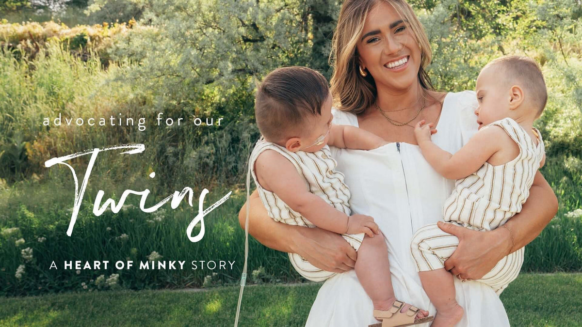 Advocating for our Twins - A HEART OF MINKY STORY with a mother and her twins in a scenic outdoor setting.