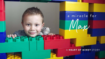 A Heart of Minky Story - A Miracle for Max with a smiling boy surrounded by colorful building blocks.