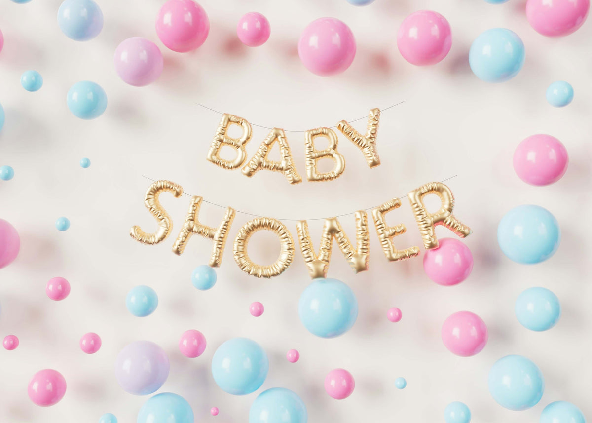 Best Baby Shower Gifts: Why Gift Personalized Minky Blankets? Baby shower decorations with colorful balloons and banners.