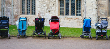 The Ultimate Guide to Choosing the Perfect Stroller for Your Family various strollers lined up outdoors