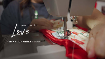 Heart of Minky Story Sewn with Love, seamstress sewing a Minky blanket with care and precision.
