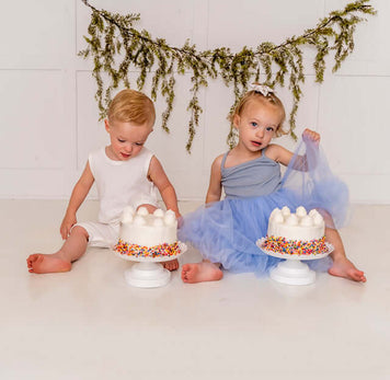 Heart of Minky: Ellie and DJ enjoying cake with colorful sprinkles, celebrating a joyful moment together.