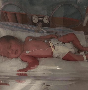 Heart of Minky: Lincoln & Daxton - newborn in a NICU incubator, showcasing their early journey.