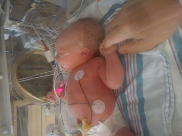 Heart of Minky: Lincoln in NICU, a newborn boy with medical equipment and care from his mother.