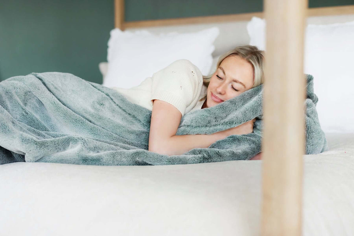 The Science of Comfort: How Minky Blankets Improve Sleep Quality in a cozy bedroom setting.
