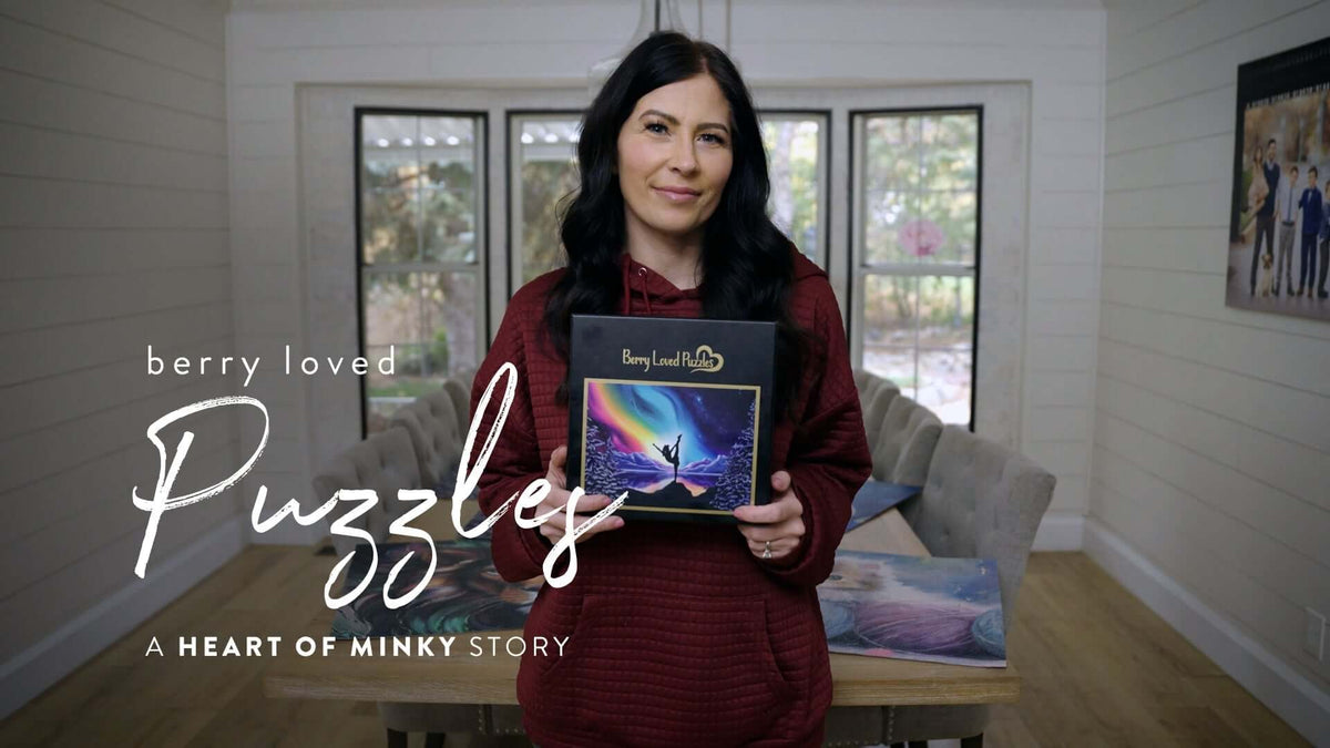 Heart of Minky Story Berry Loved Puzzles: Woman holding Berry Loved Puzzles box in a bright room.