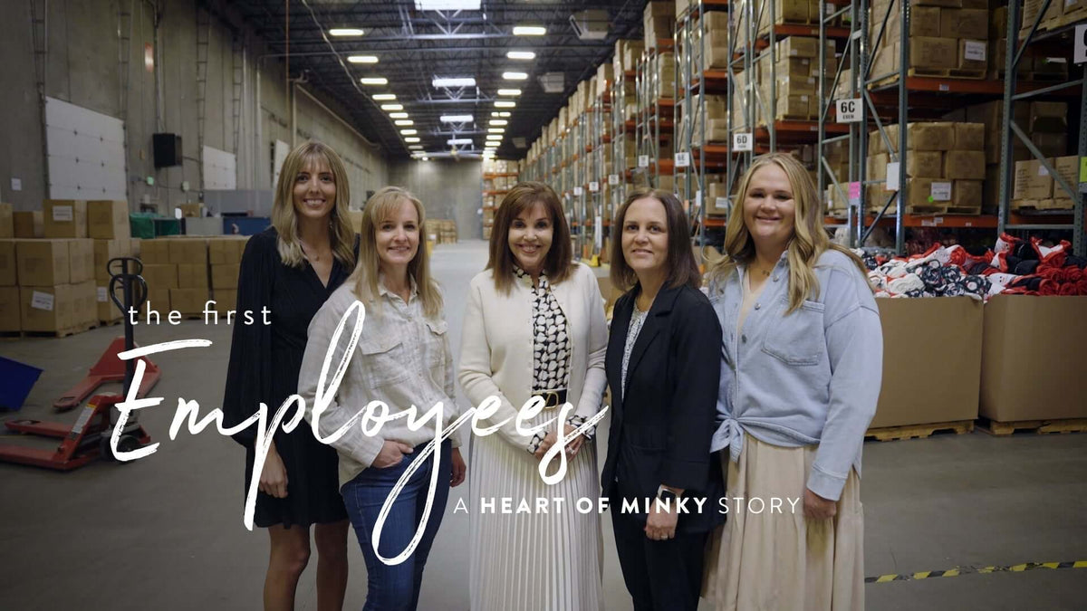 The first Employees - A Heart of Minky Story featuring five women in a warehouse setting.