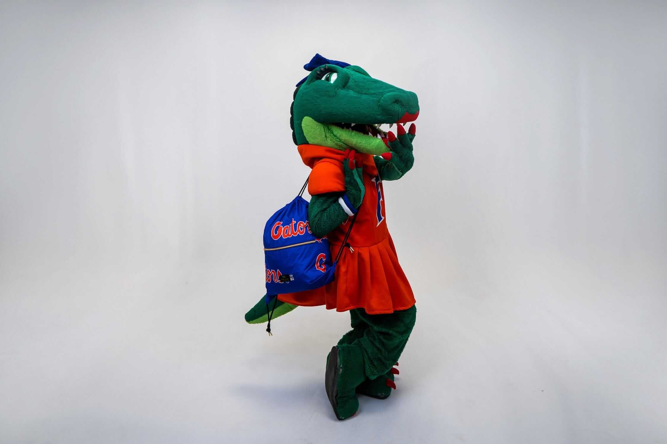 Florida Gators Hooded Stadium Blanket mascot in vibrant outfit celebrating Gators spirit.