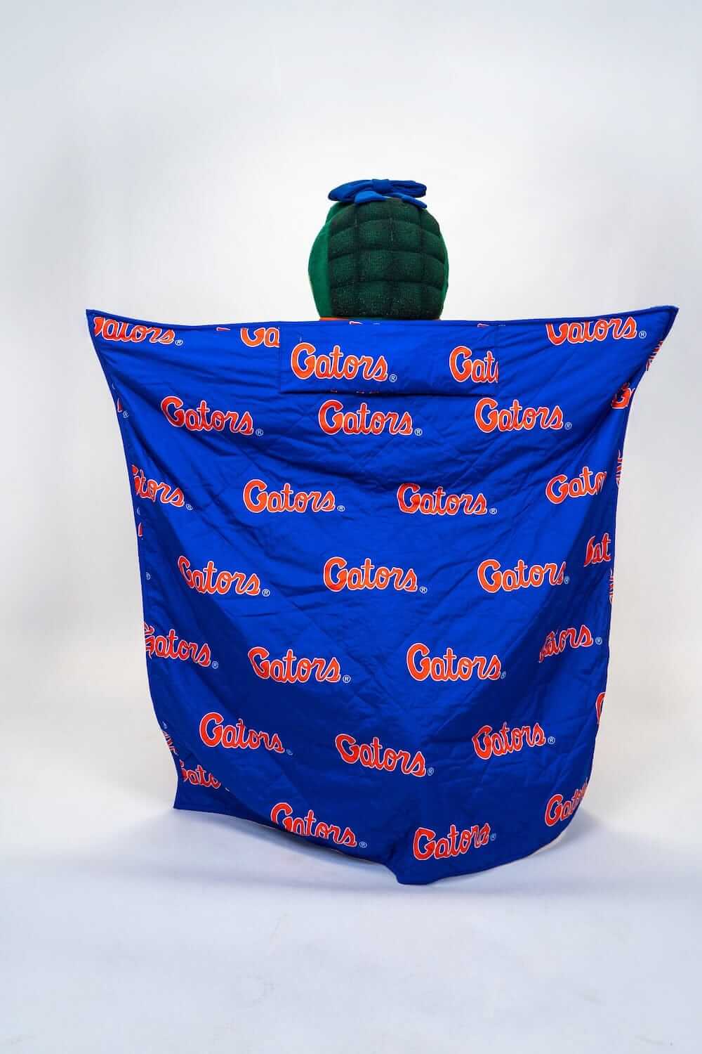 Florida Gators Hooded Stadium Blanket displayed with Gators logo pattern, showcasing blue and orange colors.