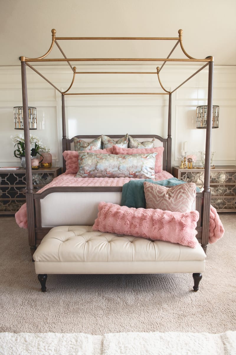 Ballet Rose Cloud Duvet displayed on a luxurious canopy bed with soft blush pillows and a cozy throw.