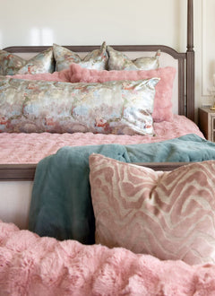 Ballet Rose Cloud Duvet with plush pillows in soft blush and teal hues for a luxurious bedding aesthetic.
