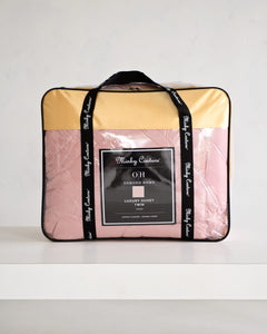 Ballet Rose Cloud Sham luxury duvet by Minky Couture, featuring a soft blush color and elegant packaging.