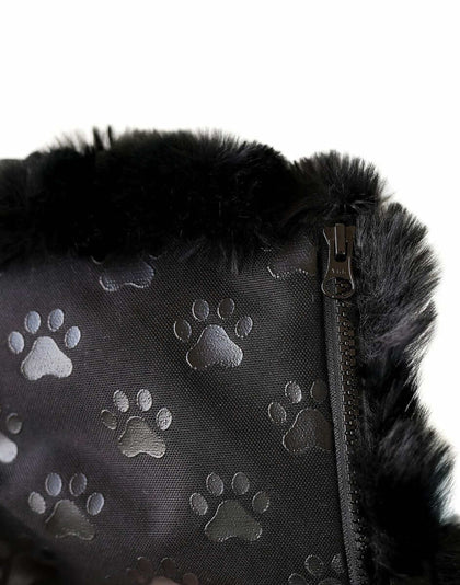 Black Crinkle Pet Crate Pad cover with paw prints and zipper detail for easy removal and cleaning.