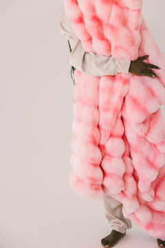 Extreme Ultra Cloud Pink Lemonade Blanket displayed in a vibrant hot pink hue, showcasing its plush texture and cozy design.