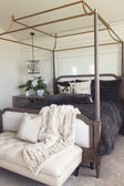 A beautifully styled bedroom featuring the Charcoal Cloud Duvet on a four-poster bed, creating a cozy and sophisticated atmosphere.