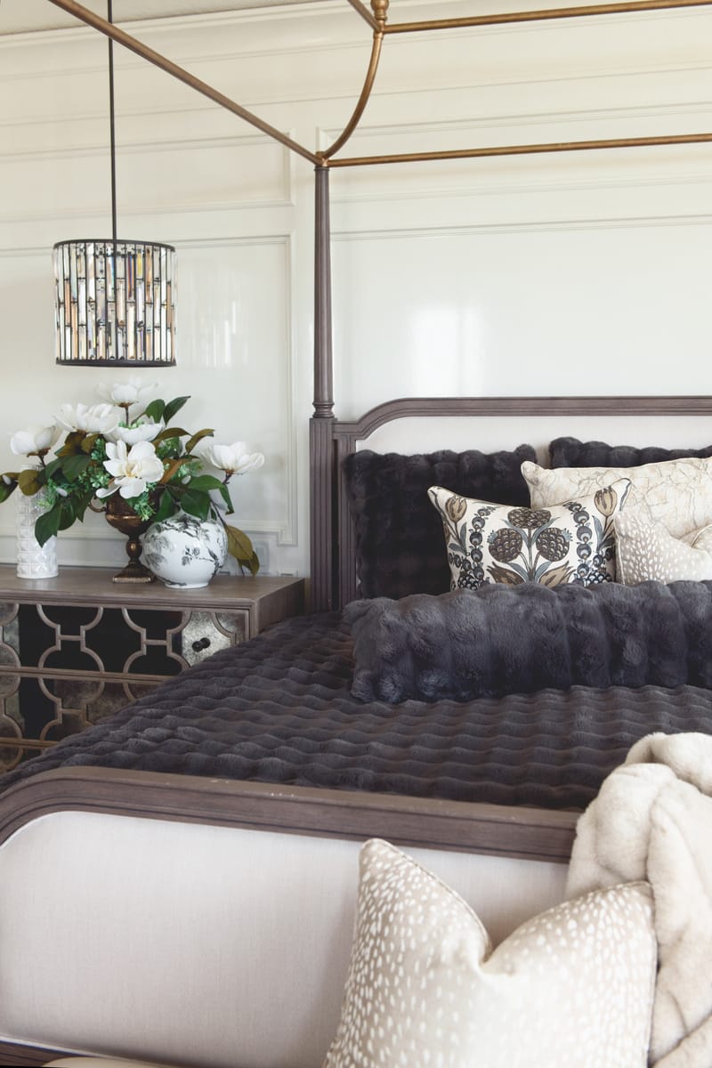 Charcoal Cloud Sham on a beautifully styled bed with textured pillows and elegant decor.