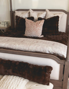 Chocolate Cloud Duvet displayed on a luxurious bed with elegant pillows, showcasing rich brown tones for comfort.