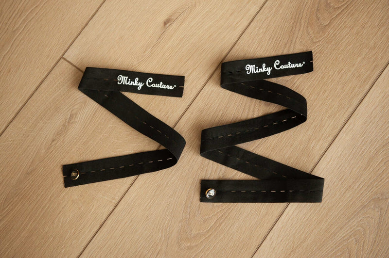 Minky Keepers: set of two black straps designed for rolling and securing blankets.
