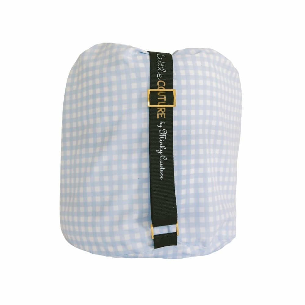 Sleeping Bag Dusty Blue Gingham rolled and secured with black strap for easy storage and transport.