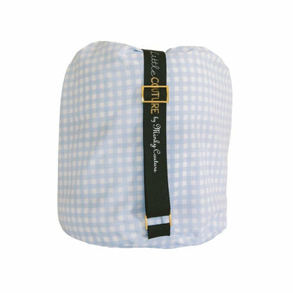 Sleeping Bag Dusty Blue Gingham rolled and secured with black strap for easy storage and transport.