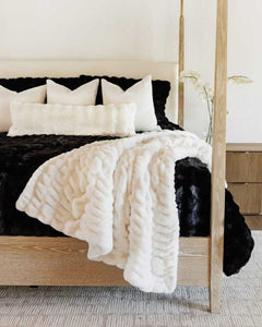 Cream Cloud Sham displayed on a stylish bed, featuring plush textures and elegant decor.