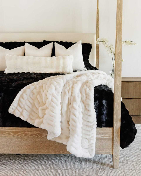 Cream Cloud Sham displayed on a stylish bed, featuring plush textures and elegant decor.