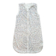 Sleeveless baby sleep sack with a soft floral print in light blue and taupe tones.