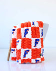 Orange and white checkered Minky Couture Florida Gators blanket with blue F logos.