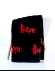 Black Nebraska Huskers Minky Couture blanket with red Huskers text.