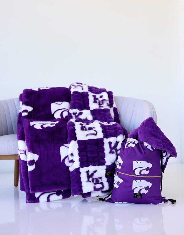 Purple Kansas State Wildcats blankets and matching bag with white wildcat and “KS” designs.