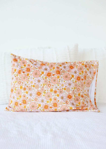 Boho Floral Blanket featuring orange and pink floral patterns on a cozy cotton pillow.