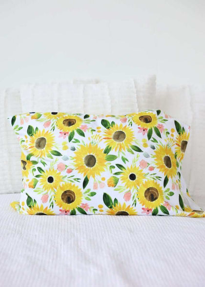Little Miss Sunshine Blanket featuring vibrant sunflowers and floral accents on a cream background.