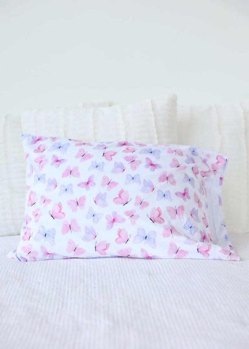Pastel Butterfly Blanket with pink and lilac butterflies on a white background, perfect for a cheerful decor.