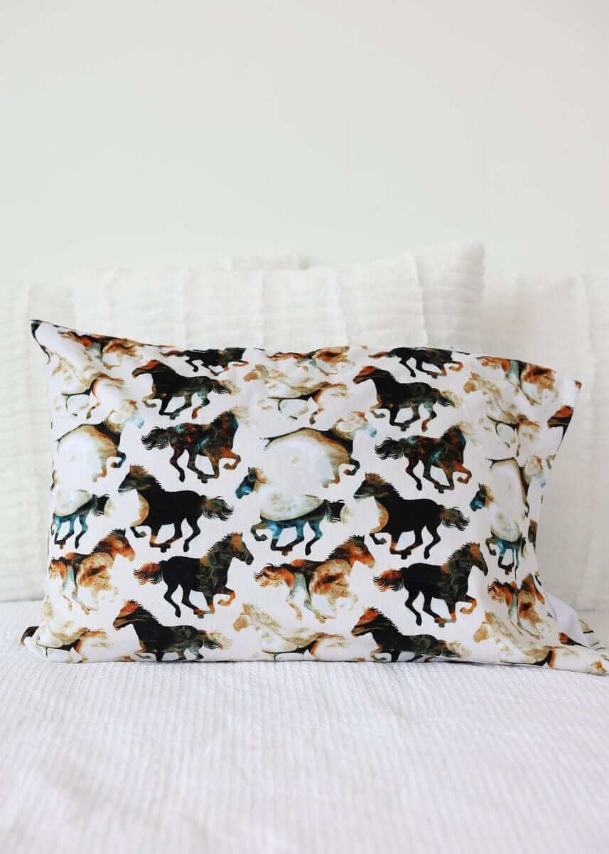 Stallion Blanket featuring watercolor horses on a cream background, perfect for western and rodeo-themed decor.