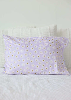 Lavender Daisy Blanket pillow featuring cheerful white daisies on a serene lilac background.