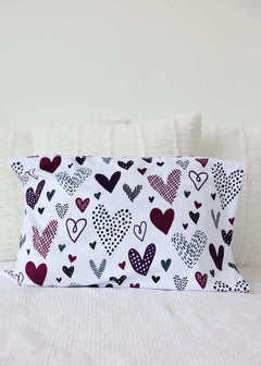 Love Notes Plum Blanket with sweet doodled hearts in purples and grays on a paper-white background.
