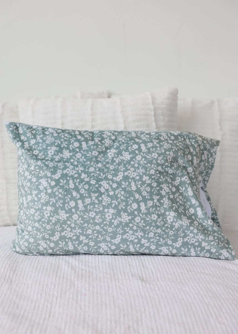 Dainty Floral Sage Blanket with delicate floral pattern on a soft sage backdrop, perfect for cozy elegance in any room.