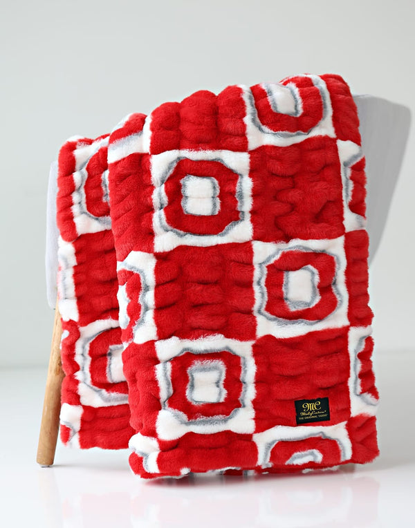 Cozy red patterned Ohio State Buckeyes Blanket, perfect for fans, featuring collegiate design and soft texture.