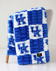 University of Kentucky blanket featuring a blue and white checkered blanket with a logo.