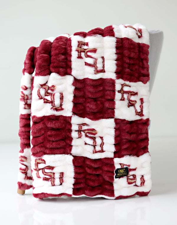 Florida State Seminoles Blanket in red and white checkered pattern, showcasing team logo design.