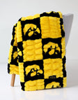 University of Iowa Blanket in black and yellow featuring a cozy plaid design, perfect for fans and warmth.