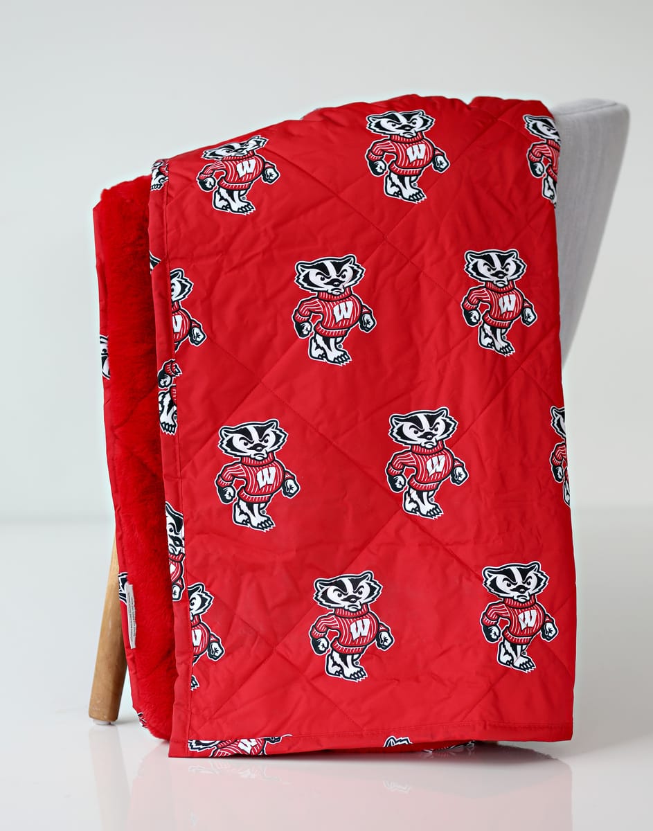 University of Wisconsin Badgers Hooded Stadium Everywhere Blanket featuring bold red fabric with Badgers mascot pattern.