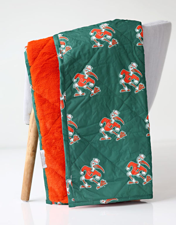 Miami Hurricanes Hooded Stadium Everywhere Blanket featuring vibrant team colors and soft plush interior.