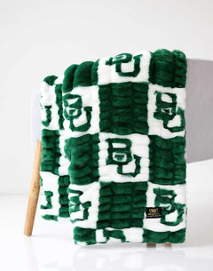 Baylor Bears Minky Couture blanket folded over a chair.