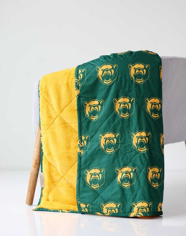 Baylor Bears Hooded Stadium Blanket Everywhere Minky Couture blanket folded over a chair.