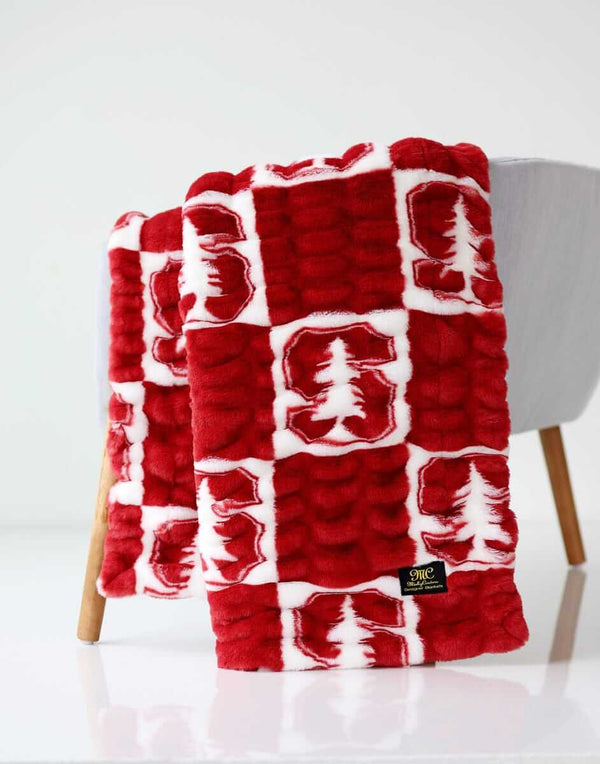 Stanford Cardinals Minky Couture blanket folded over a chair.