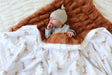 Plush Minky Couture Little Giraffe Blanket with playful giraffes, perfect for cozying up with a little one.