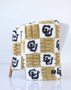 Colorado Buffaloes Blanket featuring soft, stretchy gold and cream check pattern with bold CU logos.