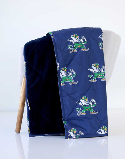 Notre Dame Fighting Irish Hooded Stadium Blanket showcasing navy exterior with logo and plush interior.